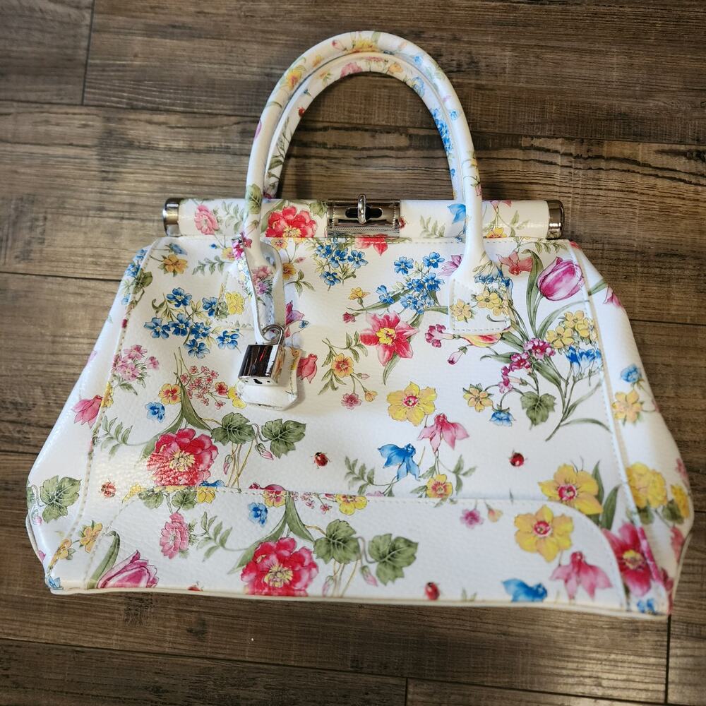 Giada Pelle floral purse with padlock charm and twist clasp closure G